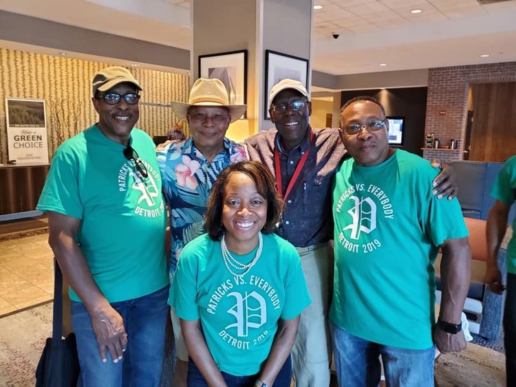 Family members posing together at a past reunion